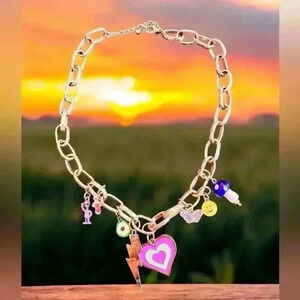 Handmade Gold Colored Charm Necklace by HKYEAH VINTAGE